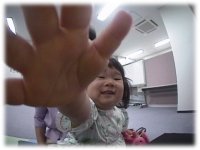 photo: Keepon's view (A girl is reaching out to Keepon)